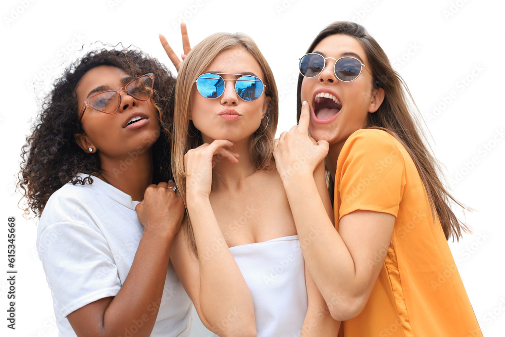 Three young smiling hipster women in summer clothes posing on a transparent background. Female showing positive face emotions. Three young smiling hipster women in summer clothes posing on a transparent background. Female showing positive face emotions.