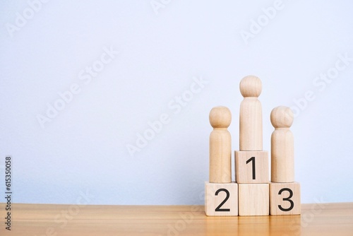 Wooden blocks stacked as a platform on a white background. Success or ranking ideas.