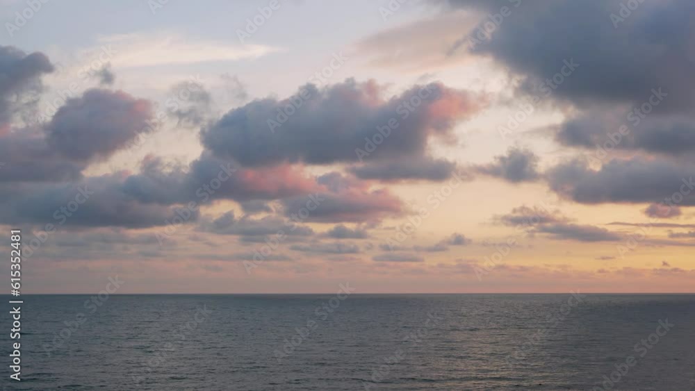 Delightful Sunset Of A Colorful Sky Of Cumulus Clouds Of The Sun over A Calm Sea, Time Lapse. Beautiful Seascape of a Sunset Cloudy Sky and Calm Water in the Ocean, Timelapse. 4K Natural Background. Delightful Sunset Of A Colorful Sky Of Cumulus Clouds Of The Sun over A Calm Sea, Time Lapse. Beautiful Seascape of a Sunset Cloudy Sky and Calm Water in the Ocean, Timelapse. 4K Natural Background.