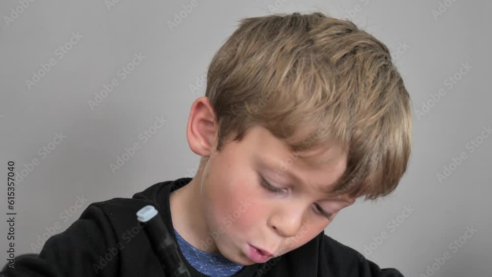 adorable caucasian boy of elementary age draw adorable caucasian boy of elementary age draw