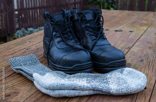 Clean Black Leather Work Boots and Woolen Socks