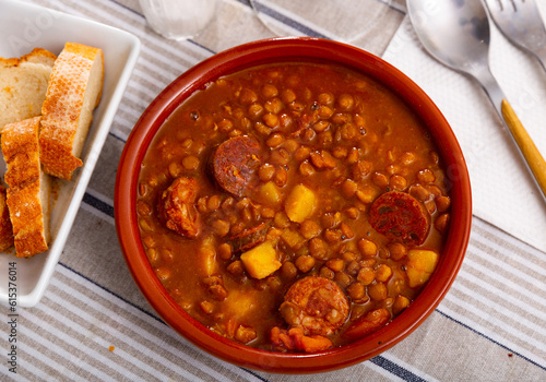 National Spanish dish Lentejas con chorizo, beans stewed with chorizo, bacon and sausages