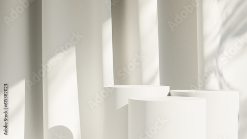 White product display podium background with sun light leaves shadow © CreatifyStudio