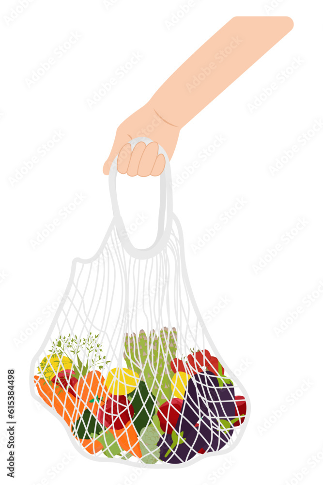 The hand holds an avoska. Avoska, a net is a woven bag. Avoska with vegetables and fruits.