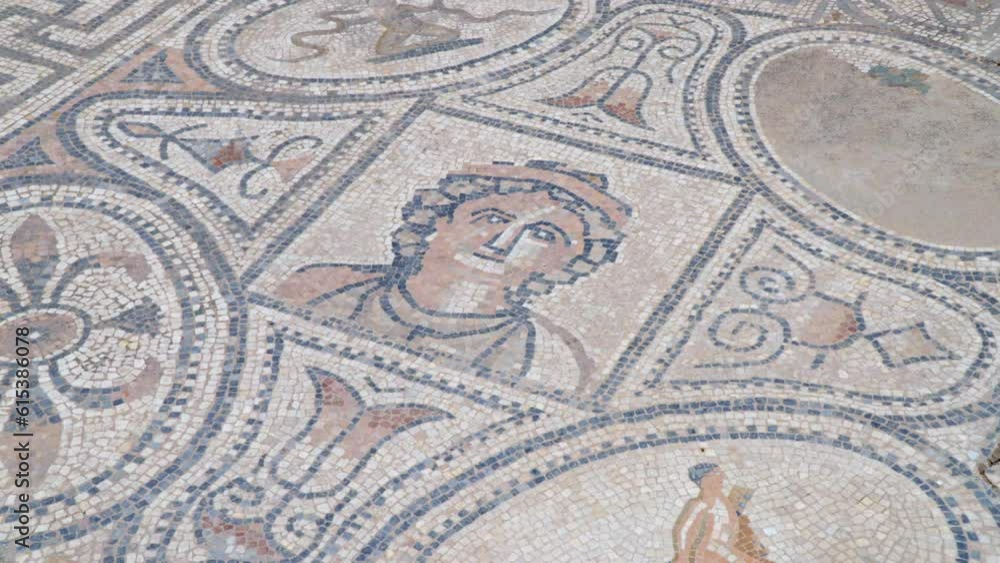 Immerse yourself in the intricate beauty of ancient tile art with a captivating zoom-in on the exquisite ruins of Volubilis in Meknes, Morocco. Immerse yourself in the intricate beauty of ancient tile art with a captivating zoom-in on the exquisite ruins of Volubilis in Meknes, Morocco.