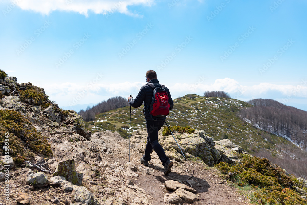 Man walking on a mountain trail. Montseny mountains, Catalonia, Spain.