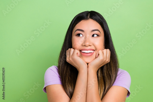 Fotografi Photo of pretty vietnamese chinese young girl look empty space admire dressed st