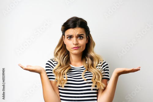 confused young woman making scale balance with hands, decision making 