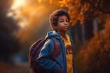 Small boy walking by the street with his school backpack. Generative AI