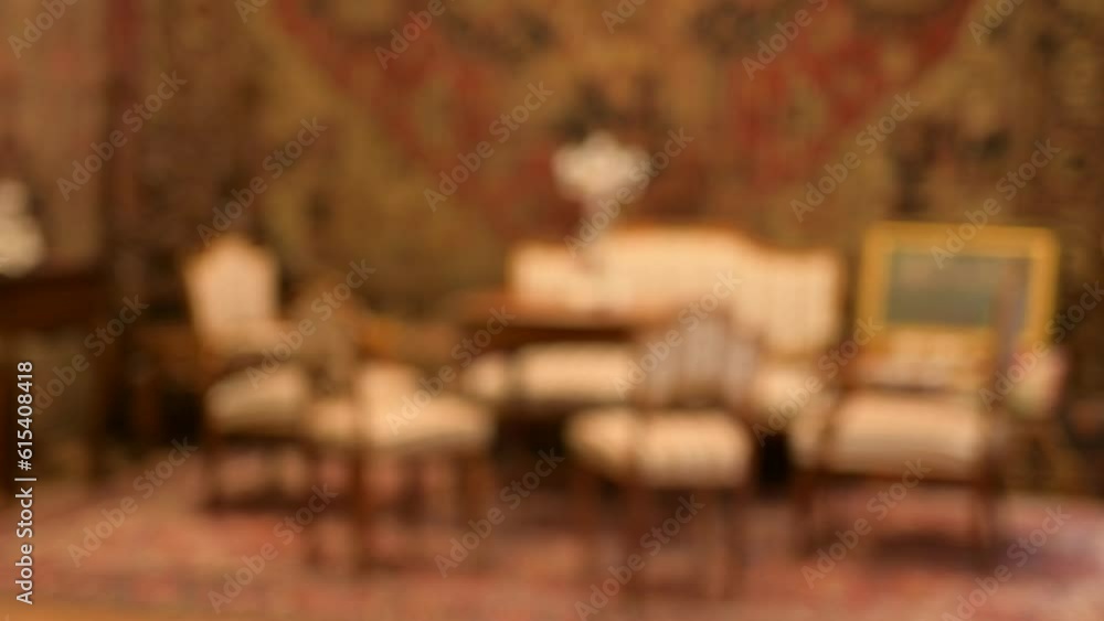 Buying antiques in an antique shop. Woman and man shaking hands then Man pays her with euros. Buying antiques in an antique shop. Woman and man shaking hands then Man pays her with euros.