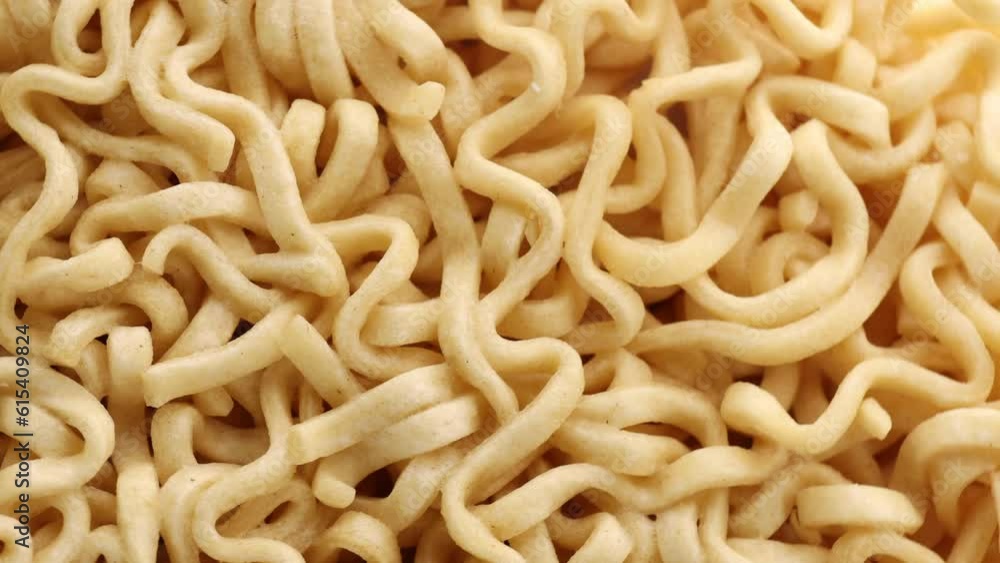 Dry instant noodles texture , rotation in circle. Raw noodles, Turning. selective focus Dry instant noodles texture , rotation in circle. Raw noodles, Turning. selective focus
