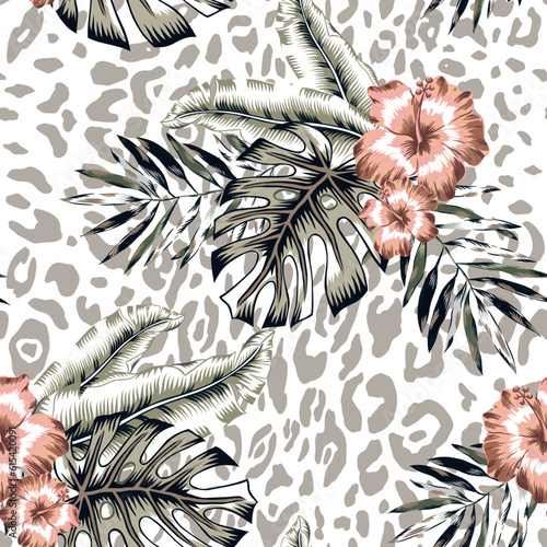 Tropical hibisus flowers, monstera palm leaves, leopard spots animal print background. Seamless pattern. Vector illustration. Exotic plants. Summer beach floral design