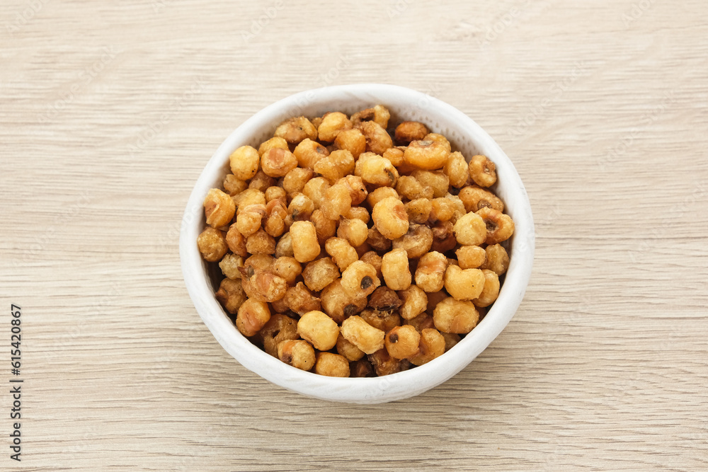 Marning, heap of crispy roasted corn kernels, traditional snack from Indonesia
Marning, heap of crispy roasted corn kernels, traditional snack from Indonesia