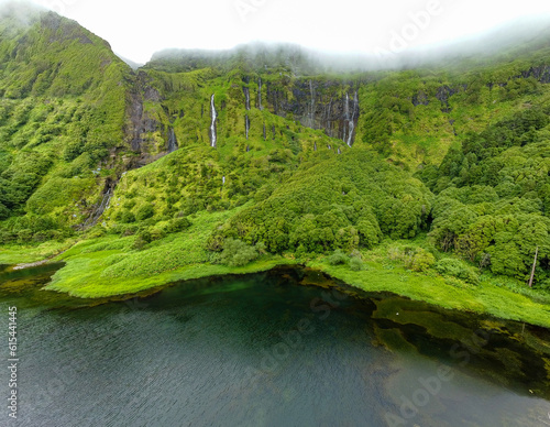 Poco da Ribeira do Ferreiro waterfall in Flores island, Azores photo