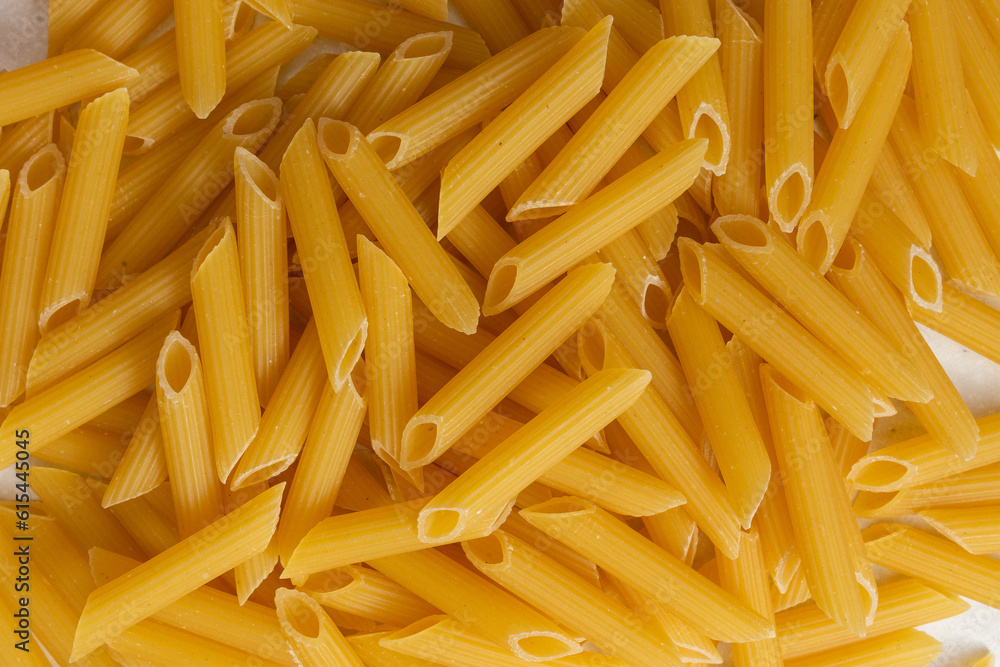 Italian pasta on table with tomatoes, pepper and different species Italian pasta on table with tomatoes, pepper and different species