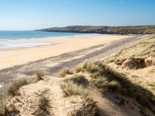 Freshwater West. Pembrokeshire, Wales.  Freshwater West, part of Pembrokeshire Coast National Park, is a stunning and desolate beach in West Wales popilar with surfers.