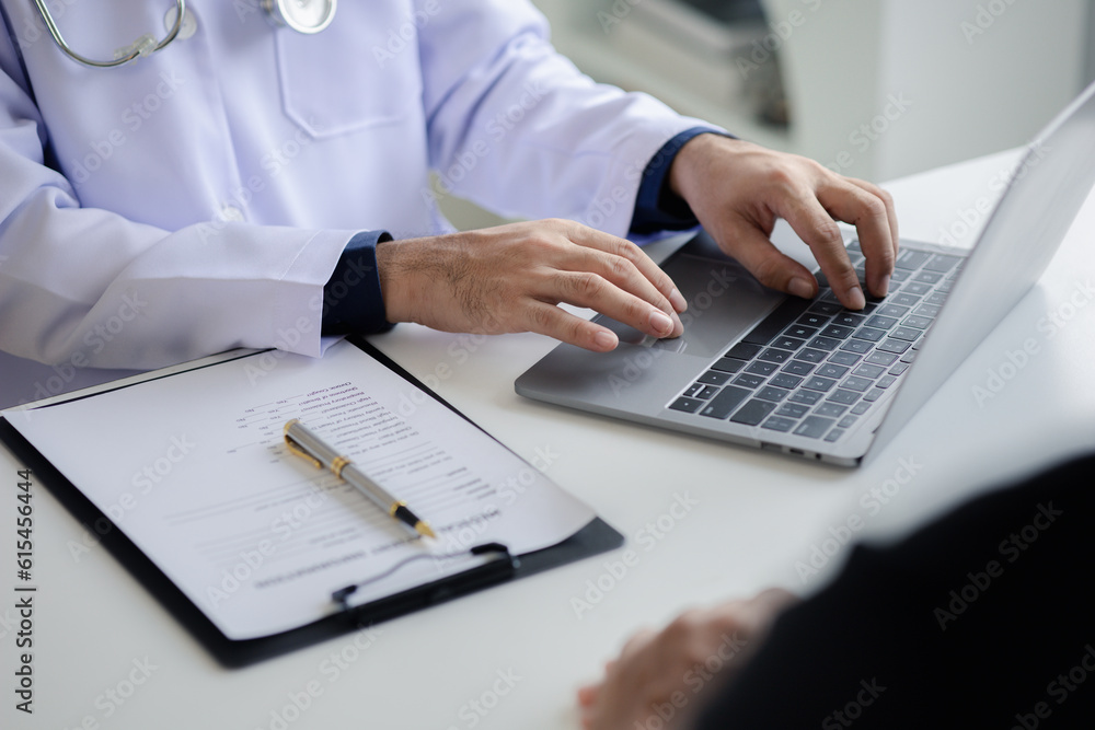 The doctor and the patient are discussing the details of the treatment, the results of the physical examination of the patient. Annual physical examination concept. The doctor and the patient are discussing the details of the treatment, the results of the physical examination of the patient. Annual physical examination concept.