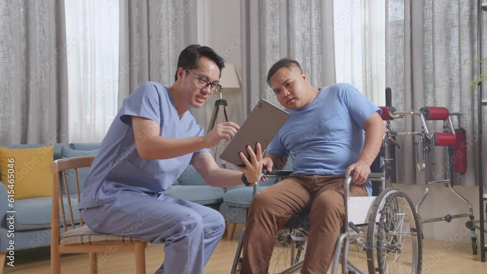 Side View Of Asian Male Nurse Showing Medical Test Results On A Tablet And Explaining To A Patient In Wheelchair During A Physical Therapy At Home
Side View Of Asian Male Nurse Showing Medical Test Results On A Tablet And Explaining To A Patient In Wheelchair During A Physical Therapy At Home