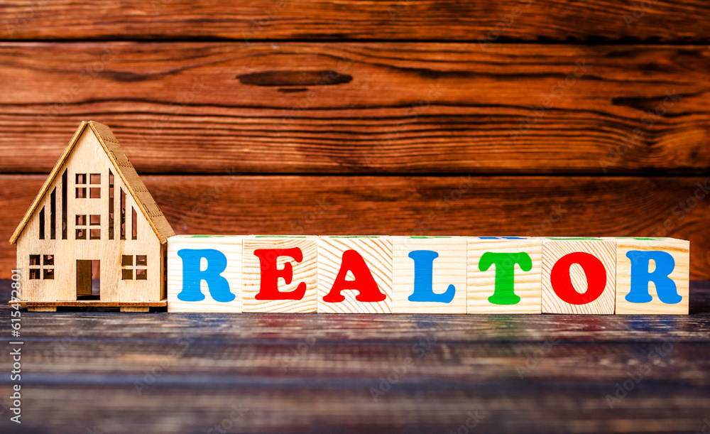 Wooden home and text on the cubes REALTOR
Wooden home and text on the cubes REALTOR
