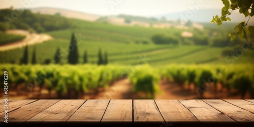 An empty wooden table for product display. blurred french vineyard in the background