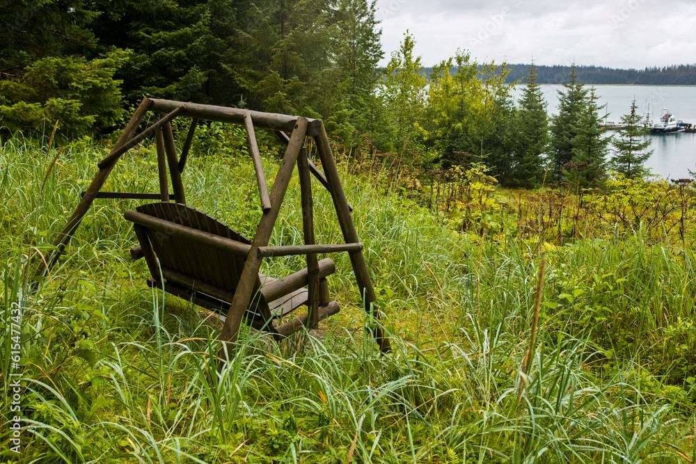 Wooden swing looking out to Glacier Bay, Alaska, USA; Alaska, United States of America