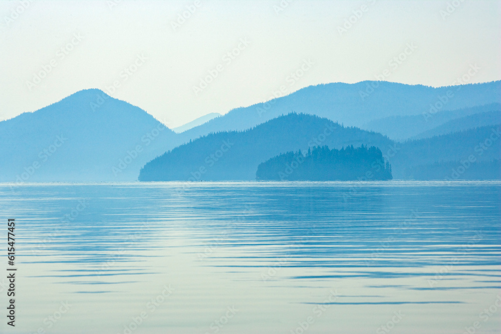 Silhouetted beauty of the Inside Passage, Alaska, USA at twilight; Petersburg, Mitkof Island, Alaska, United States of America Silhouetted beauty of the Inside Passage, Alaska, USA at twilight; Petersburg, Mitkof Island, Alaska, United States of America