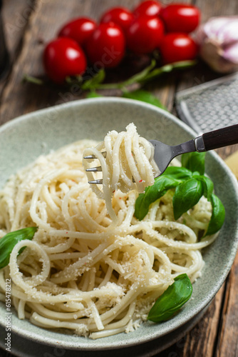 Spaghetti with parmesan cheese in a plate. Pasta with cheese