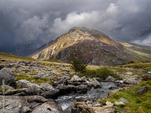 Pen yr Ole Wen, Ogwen Valley, Snowdonia. Towering over the Ogwen Valley in Snowdonia, Pen yr Ole Wen is the seventh highest peak in the region. Its name means head of the White Slope in Welsh.