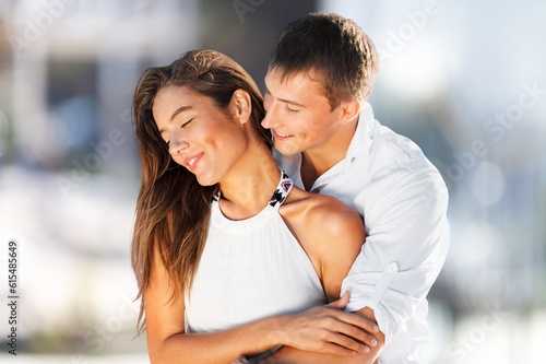 Happy young couple, hug in happiness together in the outdoors.