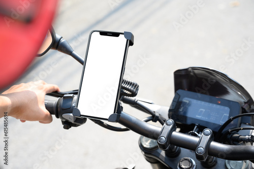 smart phone mount on motorcycle mock up, riding a motorcycle with smartphone map navigation concept, blank phone screen template on white background with clipping path