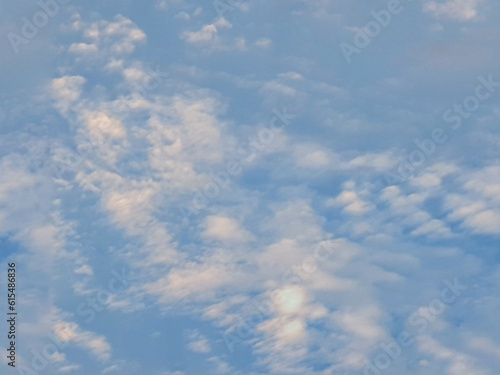 Peaceful clouds floating in the blue sky in the afternoon. Seamless cloud sky. Clouds background