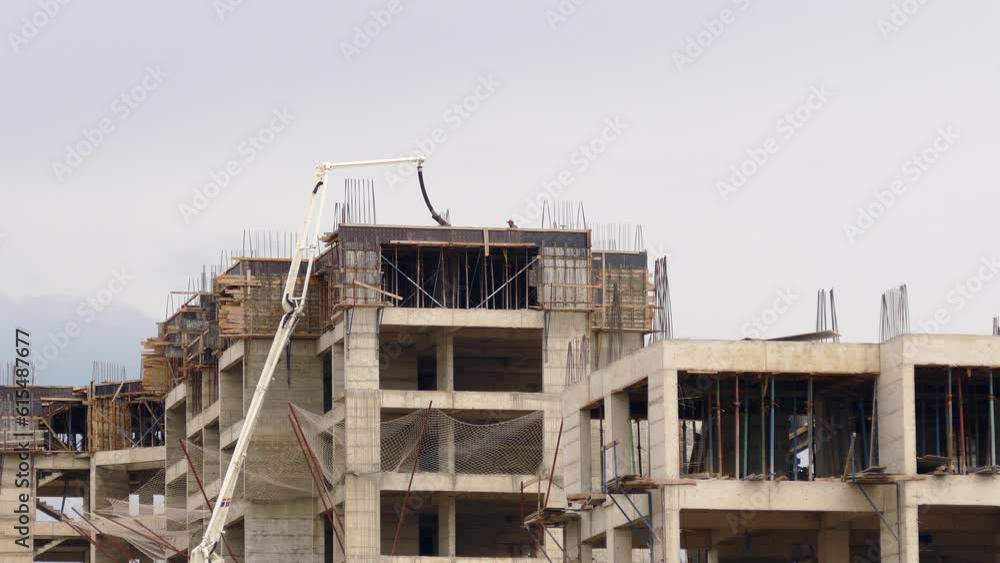 building construction and concrete mixer mortar machine is pouring concrete mortar to the construction, building construction and concrete mixer mortar machine is pouring concrete mortar to the construction,