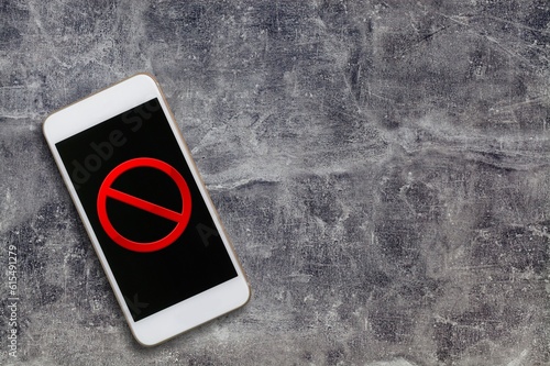 Canvas Print Crossed out red sign on phone screen.