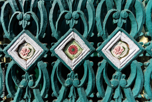 Vintage colorful floral art outside an old Portuguese era house in Goa. photo