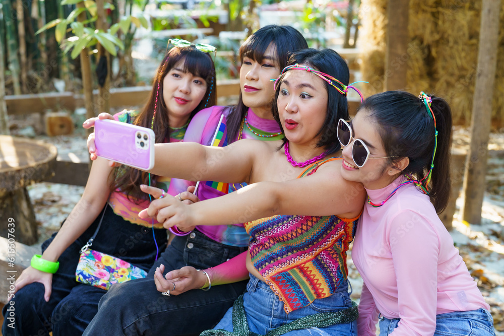 Happy friends LGBTQ transgender Asian woman taking selfie. .LGBTQIA  enjoying vacation best friends LGBT