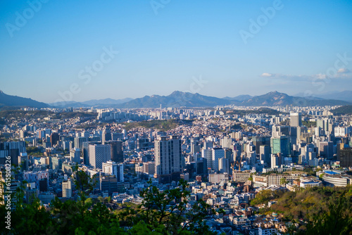 Cityscape Seoul . Aerial view of Nansan Seoul Tower and lotte tower. Viewpoint from Inwangsan mountain best landmark of Seoul , South Korea photo