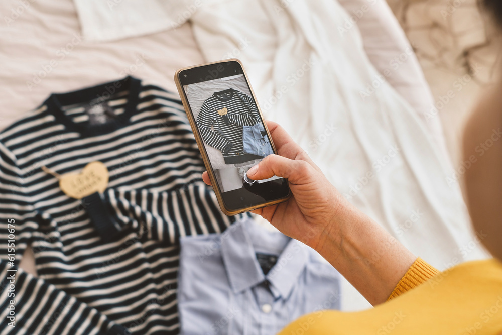 Crop woman taking photo of clothes Crop woman taking photo of clothes