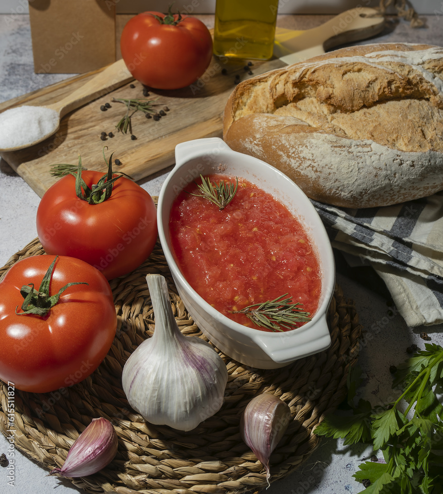 Fresh ingredients for tomato sauce preparation on table Fresh ingredients for tomato sauce preparation on table