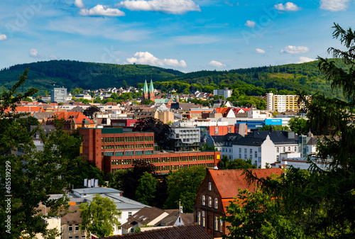 Cuadro en lienzo Panoramic view of Iserlohn town centre in rural Sauerland with hills and forests in the background