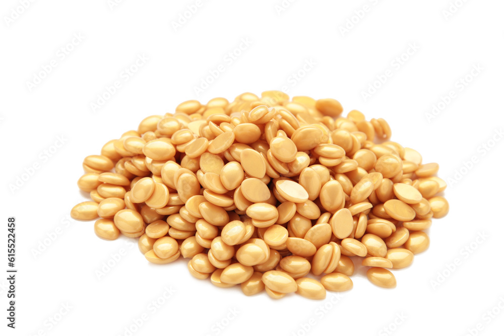 Beige wax for depilation isolated on white background.Wax granules for depilation. Epilation, depilation, removal of unwanted hair. Beige wax for depilation isolated on white background.Wax granules for depilation. Epilation, depilation, removal of unwanted hair.