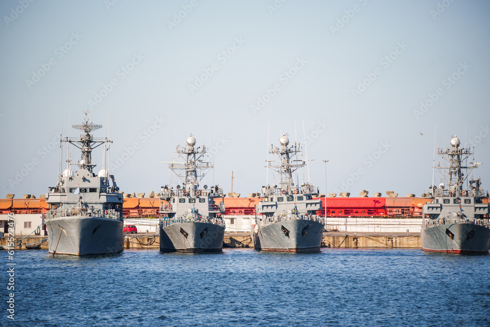 Battle ships in a naval base