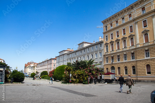 Wallpaper Mural Piazza Sant'Antonio Nuovo in Trieste, Italy, is a vibrant square with a charming atmosphere. It dates back to the 19th century and is adorned with elegant buildings, a majestic fountain, and a statue  Torontodigital.ca