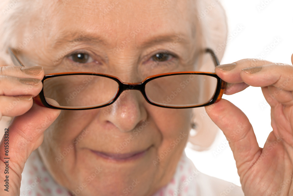 Old woman with glass, Eyesight Assitance concept Old woman with glass, Eyesight Assitance concept