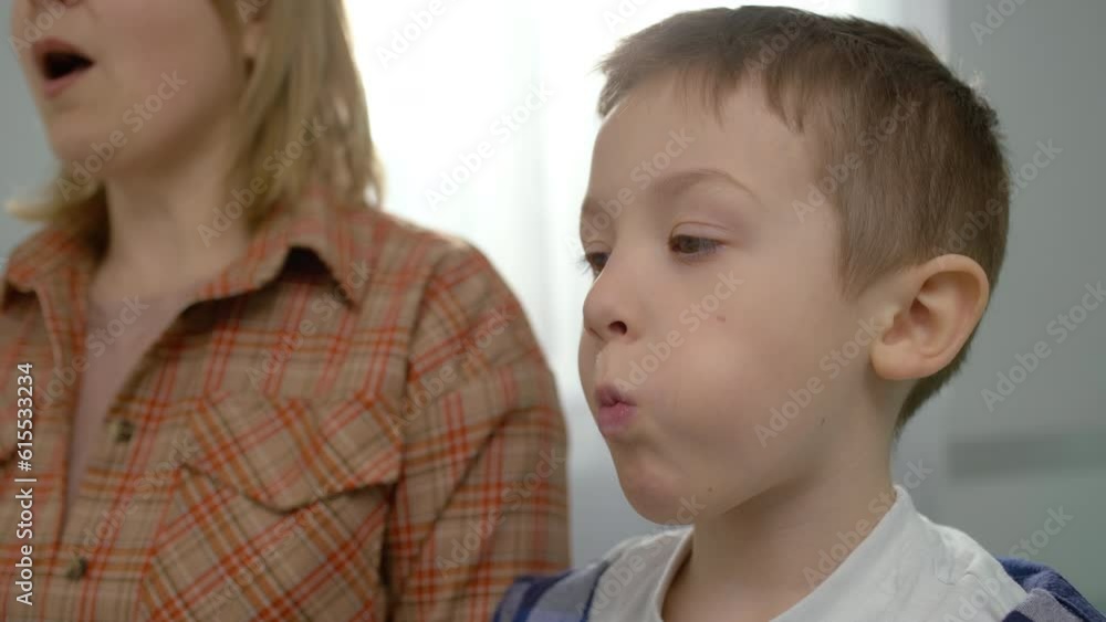 From Stumbling to Fluency: Empowering a Child's Speech and Language Skills through Expert-guided Therapy Sessions. High quality 4k footage From Stumbling to Fluency: Empowering a Child's Speech and Language Skills through Expert-guided Therapy Sessions. High quality 4k footage