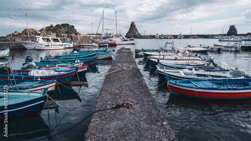 Boats at the enchanting port of Aci Trezza, Sicily photo