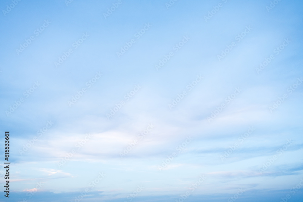 Pastel Blue and Pink Sky with light fluffy clouds Pastel Blue and Pink Sky with light fluffy clouds