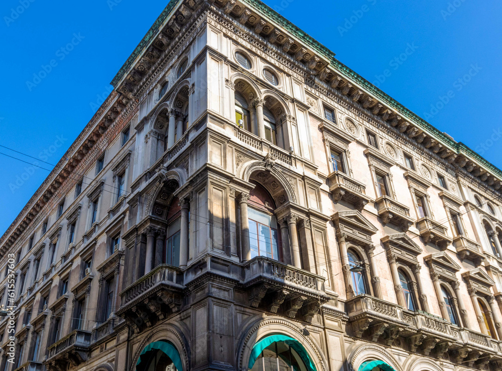 Building with nice facade and windows in Milan, Italy