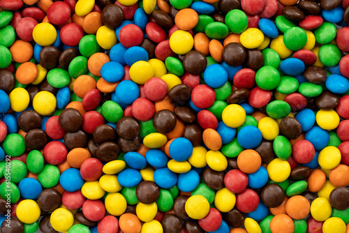 Rainbow Heap of Round Candies concept for Party Decoration, Fun Snacks, and Holiday Celebrations