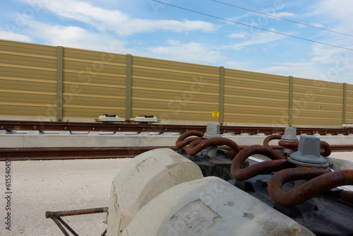 Closeup of railroad track sleepers and structural steel. ICE high speed line. Ulm, Wendlingen, A8. photo