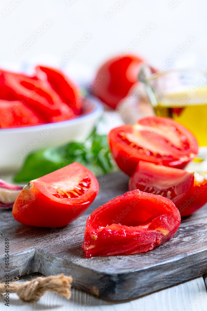 Slices of ripe tomatoes for tomato sauce. Slices of ripe tomatoes for tomato sauce.